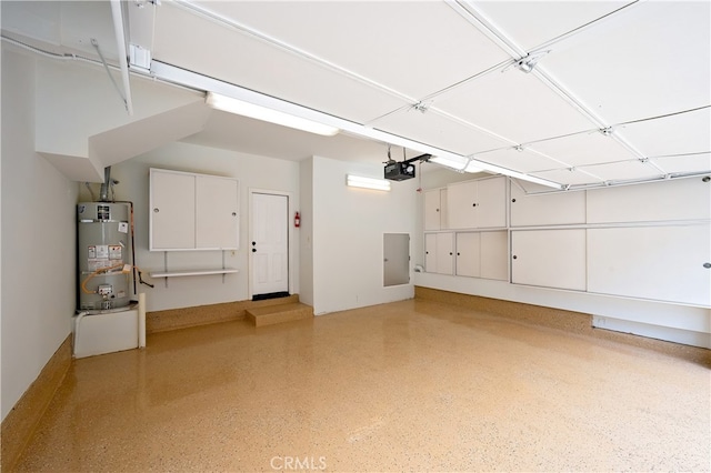 17 Calvados, Newport Coast, CA 92657 - garage with water heater, a garage door opener, and electric panel