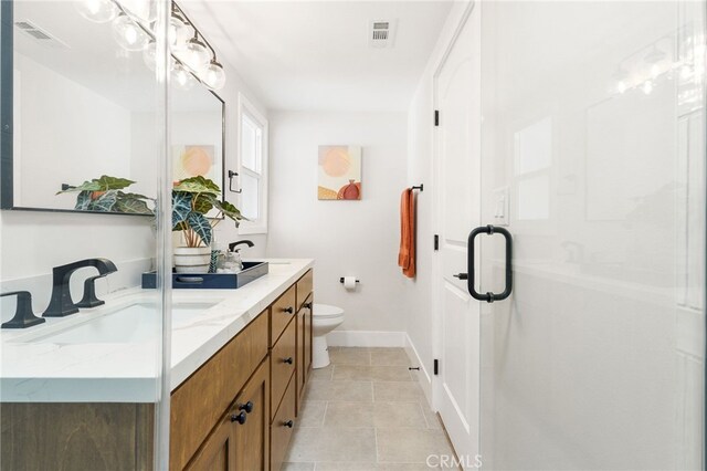 full bathroom with tile patterned floors, baseboards, toilet, and visible vents