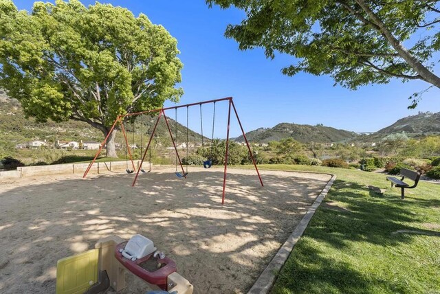 4972 Lake Shore Ct, Fallbrook, CA 92028 - community jungle gym with a mountain view and a yard