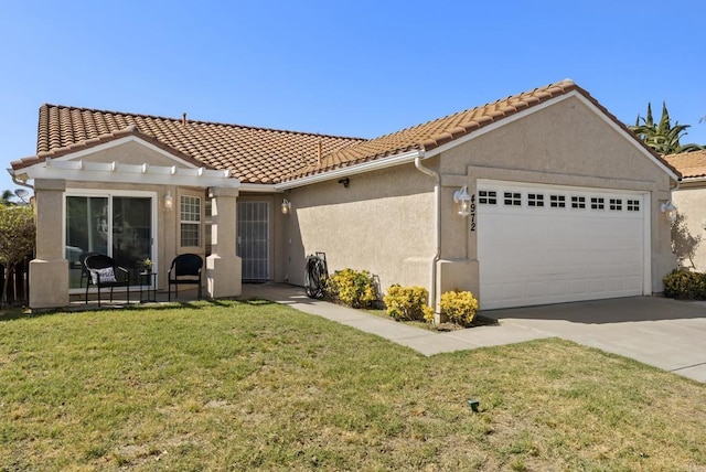 4972 Lake Shore Ct, Fallbrook, CA 92028 - back of property featuring an attached garage, stucco siding, a yard, driveway, and a tiled roof