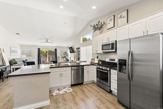 4972 Lake Shore Ct, Fallbrook, CA 92028 - kitchen featuring appliances with stainless steel finishes, a peninsula, open floor plan, white cabinetry, and recessed lighting