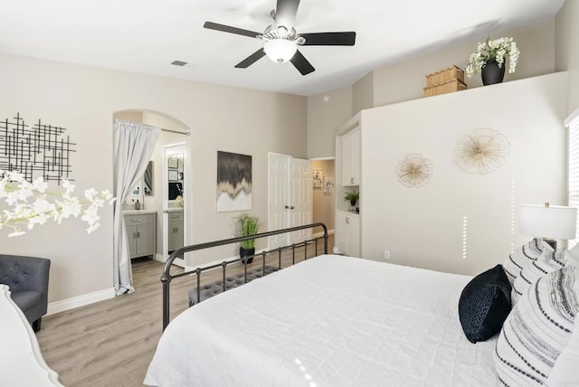 4972 Lake Shore Ct, Fallbrook, CA 92028 - bedroom featuring light wood-style flooring, baseboards, lofted ceiling, a ceiling fan, and ensuite bath