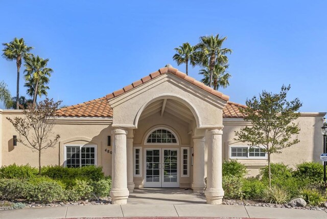 4972 Lake Shore Ct, Fallbrook, CA 92028 - entrance to property featuring french doors, a tiled roof, and stucco siding