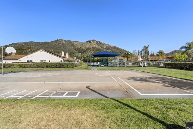 4972 Lake Shore Ct, Fallbrook, CA 92028 - view of home's community with a lawn, community basketball court, and a mountain view