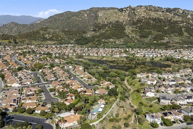 4972 Lake Shore Ct, Fallbrook, CA 92028 - aerial view of property's location with nearby suburban area and a water and mountain view