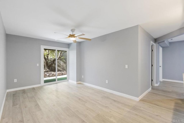 empty room with ceiling fan, baseboards, and light wood-type flooring