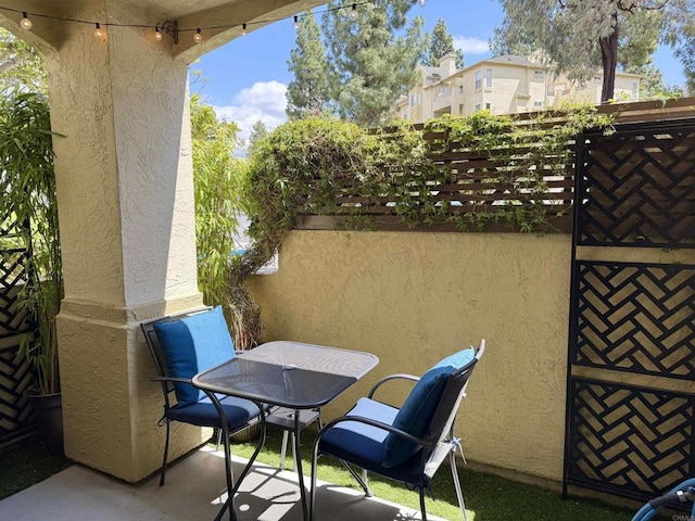 view of patio with fence