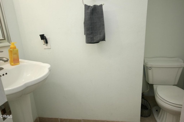 half bathroom with toilet