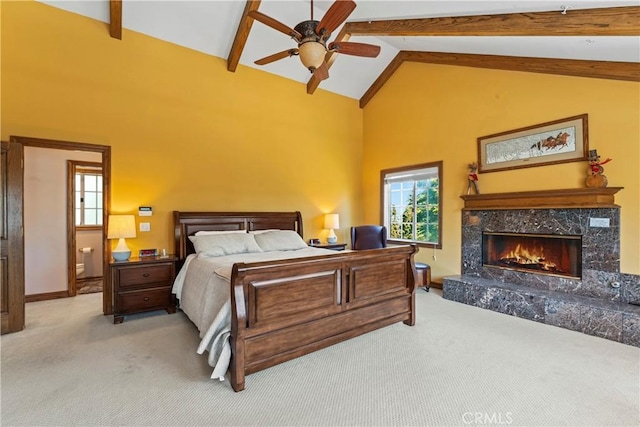 1031 Black Oaks Dr, Lake Arrowhead, CA 92352 - carpeted bedroom with high vaulted ceiling, a fireplace, and beam ceiling