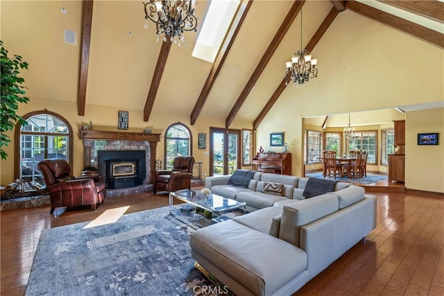 1031 Black Oaks Dr, Lake Arrowhead, CA 92352 - living area featuring a chandelier, high vaulted ceiling, hardwood / wood-style flooring, and beam ceiling
