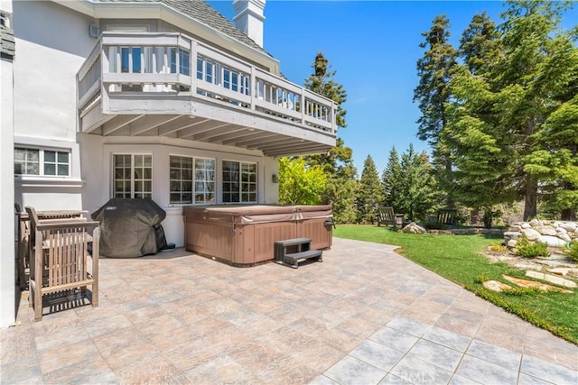 1031 Black Oaks Dr, Lake Arrowhead, CA 92352 - patio / terrace with a hot tub, a patio, and area for grilling