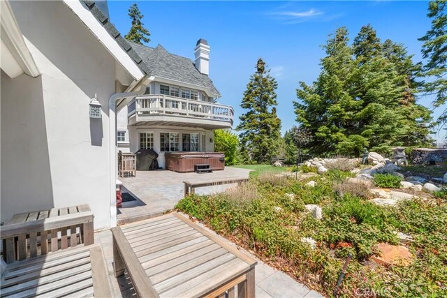 1031 Black Oaks Dr, Lake Arrowhead, CA 92352 - view of yard featuring a hot tub and a patio