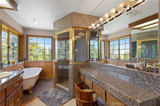 1031 Black Oaks Dr, Lake Arrowhead, CA 92352 - full bathroom with vanity, wainscoting, a stall shower, and a freestanding bath