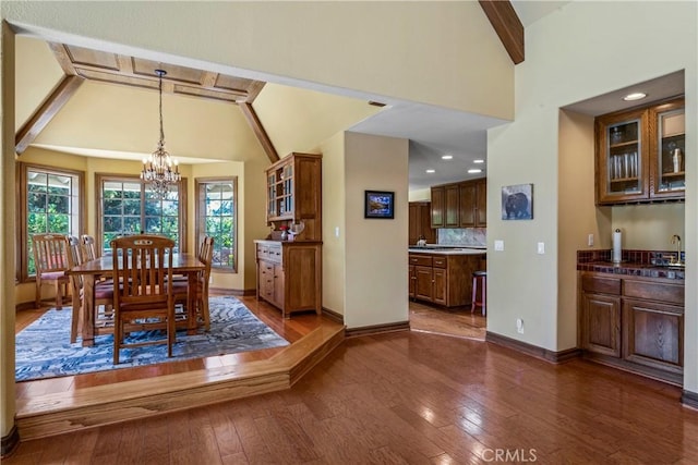 1031 Black Oaks Dr, Lake Arrowhead, CA 92352 - dining area featuring dark wood-style floors, a chandelier, and healthy amount of natural light