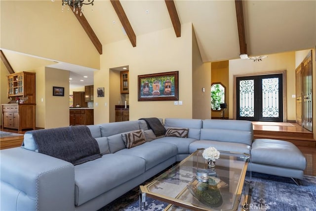 1031 Black Oaks Dr, Lake Arrowhead, CA 92352 - living room with high vaulted ceiling, beam ceiling, and french doors