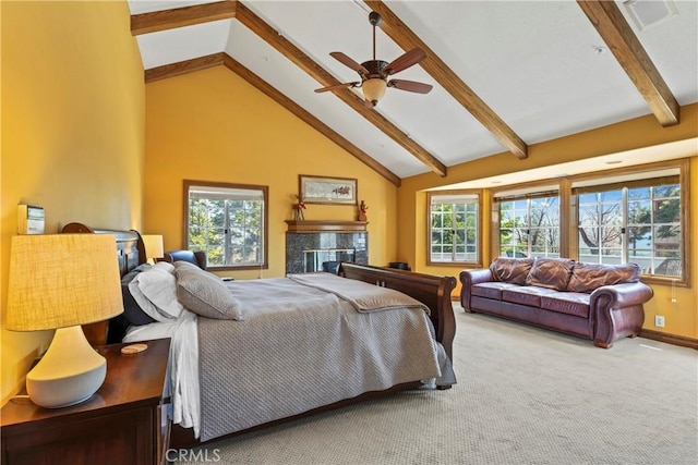 1031 Black Oaks Dr, Lake Arrowhead, CA 92352 - bedroom featuring beamed ceiling, carpet flooring, multiple windows, a fireplace, and high vaulted ceiling