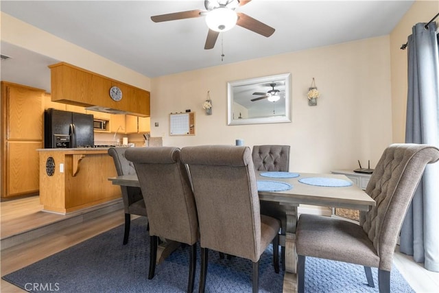 9375 Musselman Dr Unit A, Atascadero, CA 93422 - dining area featuring a ceiling fan, visible vents, and light wood-type flooring