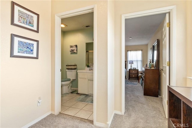 9375 Musselman Dr Unit A, Atascadero, CA 93422 - corridor with baseboards, visible vents, and light colored carpet