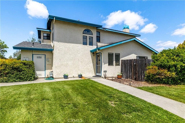 9375 Musselman Dr Unit A, Atascadero, CA 93422 - view of front of house featuring fence, a front lawn, and stucco siding