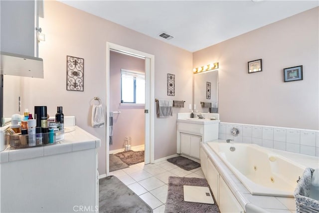 9375 Musselman Dr Unit A, Atascadero, CA 93422 - full bath featuring visible vents, tile patterned flooring, vanity, baseboards, and a whirlpool tub