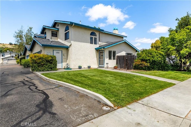9375 Musselman Dr Unit A, Atascadero, CA 93422 - traditional-style house featuring a front lawn, stucco siding, and fence