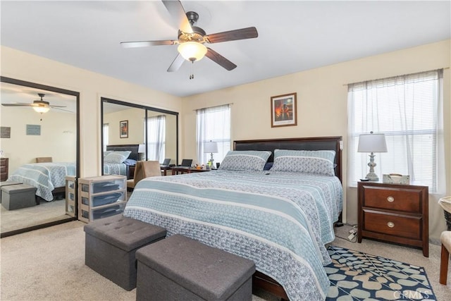 9375 Musselman Dr Unit A, Atascadero, CA 93422 - carpeted bedroom featuring ceiling fan and two closets