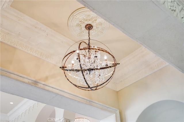 details with a chandelier and ornamental molding