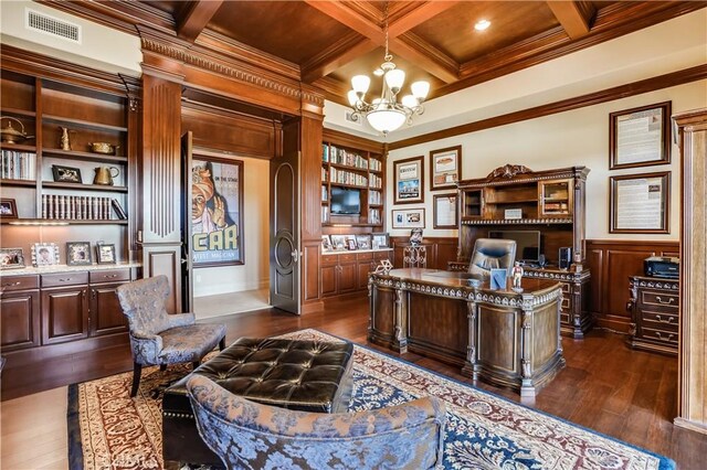 office space featuring an inviting chandelier, dark wood-style flooring, crown molding, and coffered ceiling
