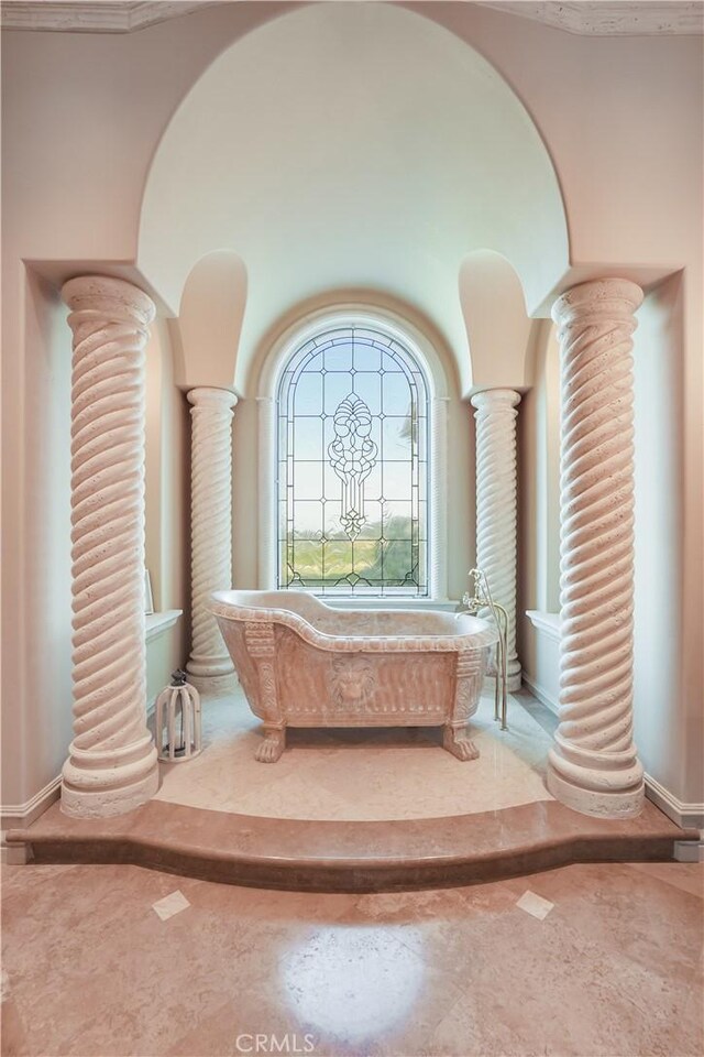 details with ornate columns and baseboards