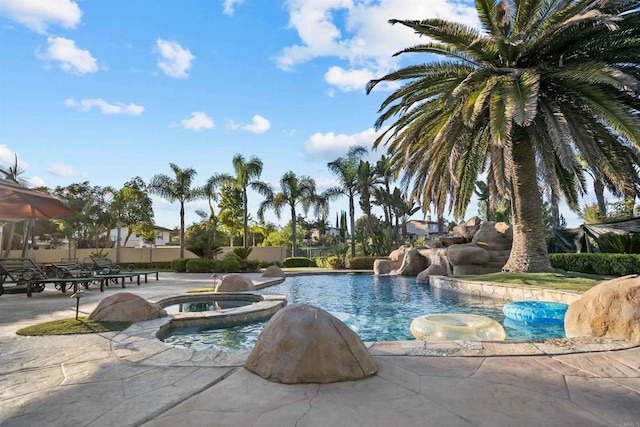 2890 Gate Fifteen Pl, Chula Vista, CA 91914 - view of swimming pool with a patio area, fence, and a pool with connected hot tub