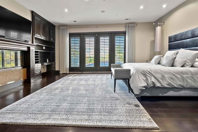 2890 Gate Fifteen Pl, Chula Vista, CA 91914 - bedroom featuring multiple windows, recessed lighting, and dark wood-style floors