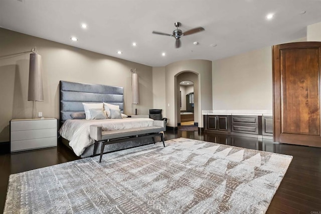 2890 Gate Fifteen Pl, Chula Vista, CA 91914 - bedroom with arched walkways, recessed lighting, dark wood-style flooring, and ceiling fan