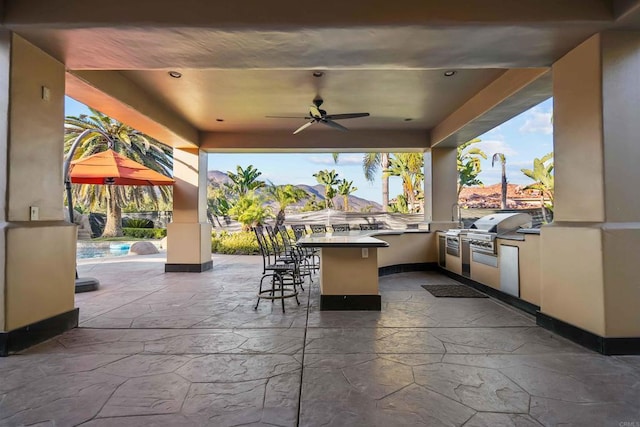 2890 Gate Fifteen Pl, Chula Vista, CA 91914 - view of patio / terrace featuring exterior kitchen, grilling area, and a ceiling fan