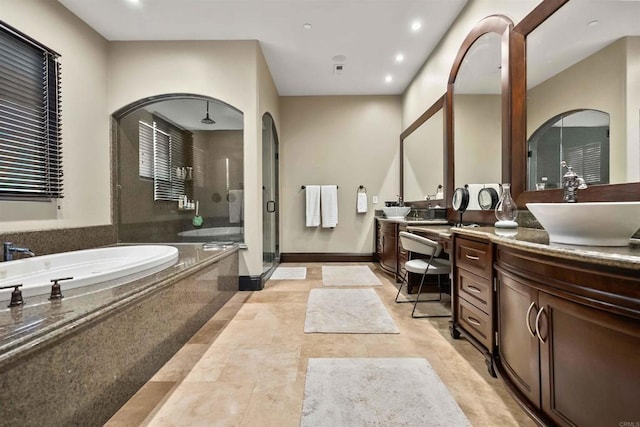 2890 Gate Fifteen Pl, Chula Vista, CA 91914 - bathroom with a shower stall, a bath, vanity, and recessed lighting