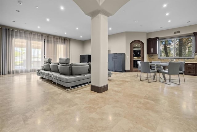 2890 Gate Fifteen Pl, Chula Vista, CA 91914 - living room featuring recessed lighting and arched walkways