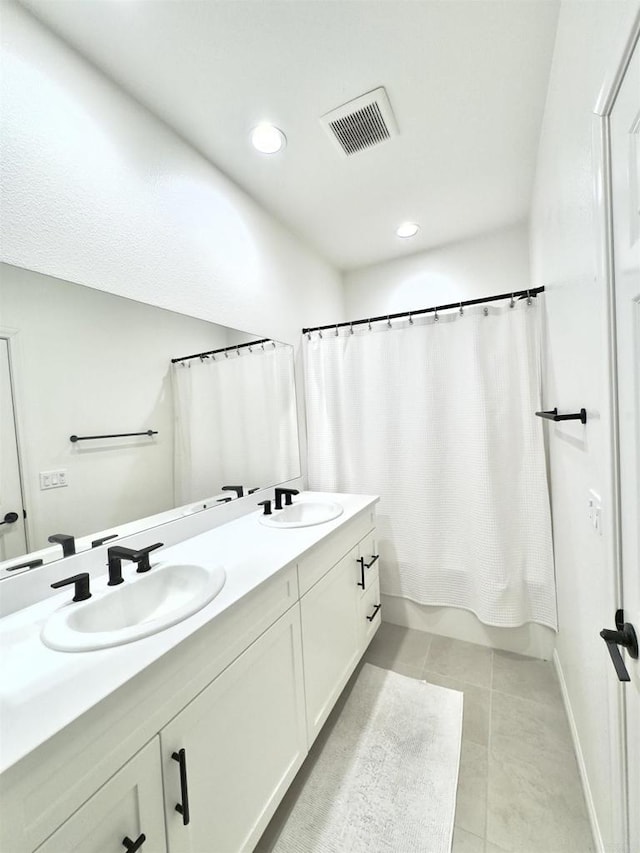 3507 Sequoia St, Lemon Grove, CA 91945 - full bath with a sink, tile patterned flooring, double vanity, and visible vents