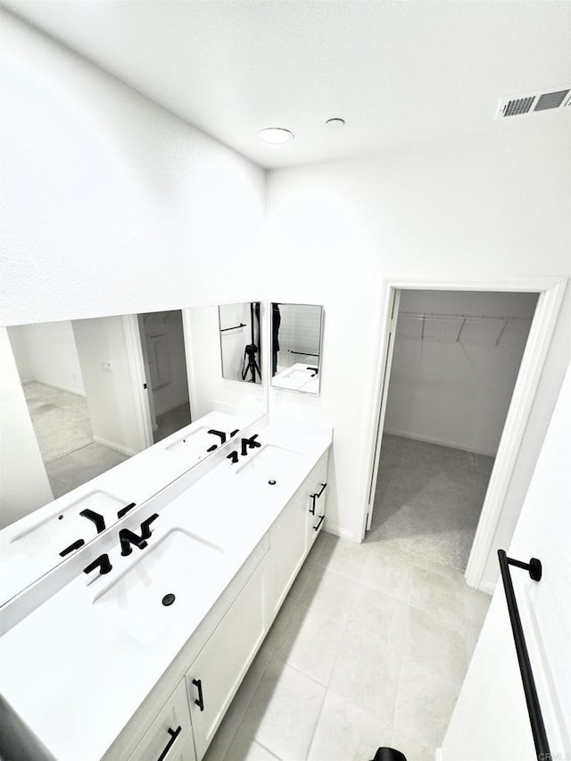 3507 Sequoia St, Lemon Grove, CA 91945 - full bath with visible vents, a sink, double vanity, and a spacious closet