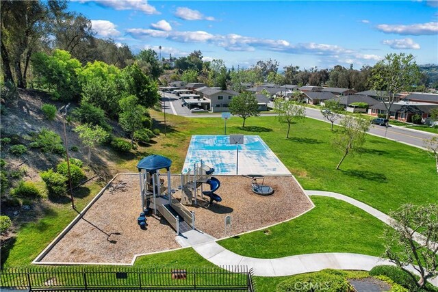 birds eye view of property with a residential view
