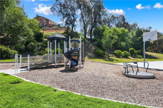 communal playground with a lawn