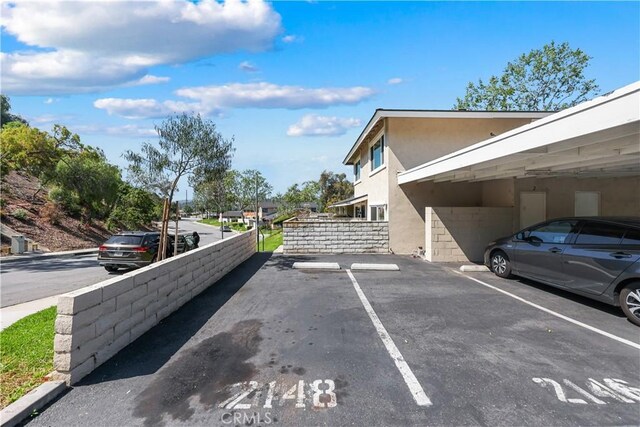 view of uncovered parking lot