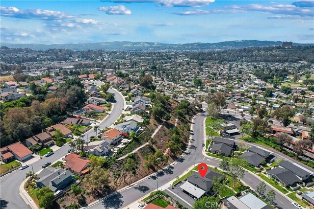 aerial view featuring a residential view and a mountain view
