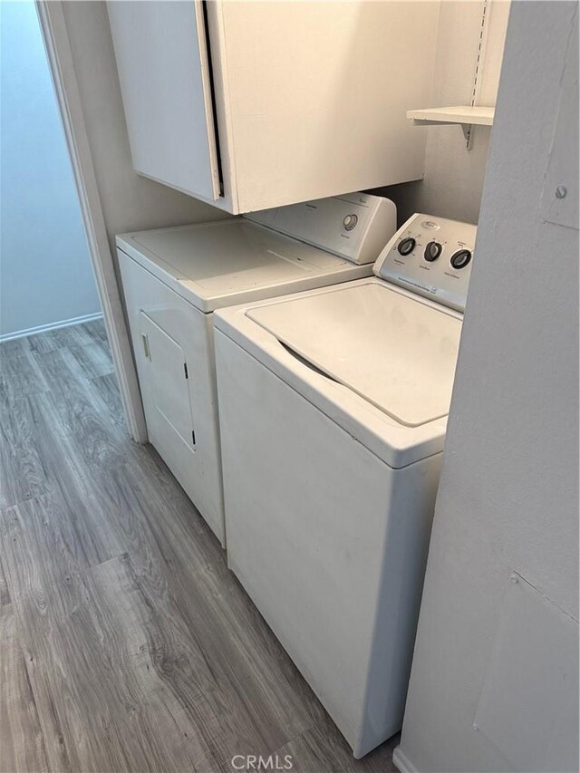2148 Eveningside Dr, West Covina, CA 91792 - washroom with separate washer and dryer and light wood finished floors