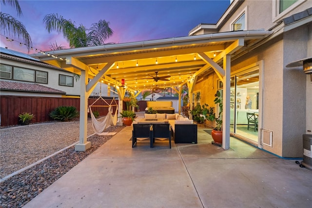 1123 Ticonderoga Ln, Hemet, CA 92545 - fenced backyard featuring outdoor lounge area, a patio, and a ceiling fan