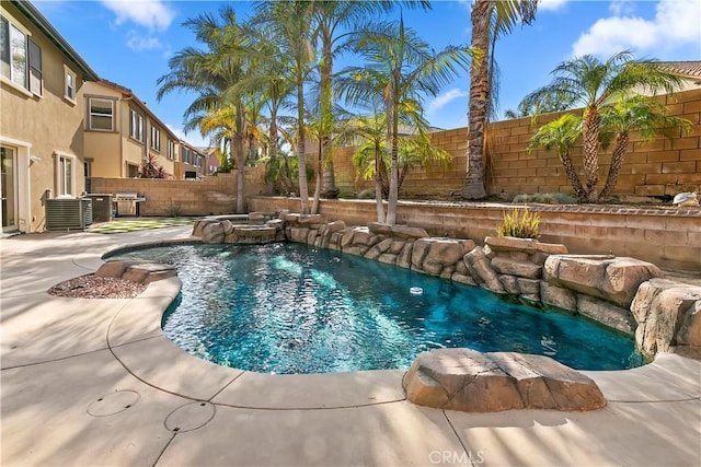 13744 Star Ruby Ave, Eastvale, CA 92880 - view of swimming pool featuring a fenced backyard, a fenced in pool, and a patio