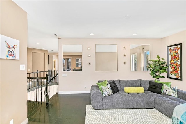 13744 Star Ruby Ave, Eastvale, CA 92880 - living room with recessed lighting, baseboards, and dark wood-type flooring