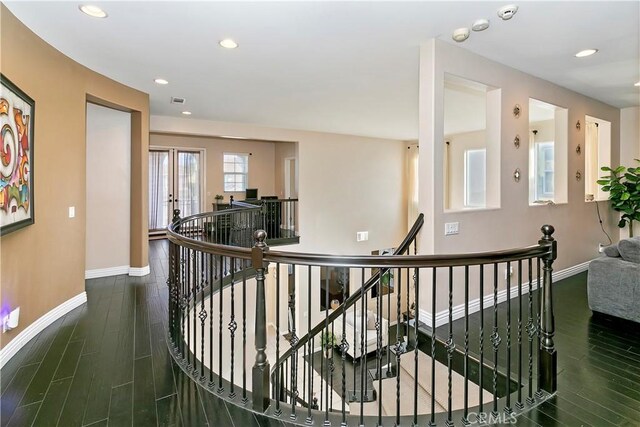 13744 Star Ruby Ave, Eastvale, CA 92880 - hallway with recessed lighting, baseboards, an upstairs landing, and wood finished floors