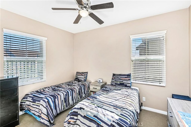 13744 Star Ruby Ave, Eastvale, CA 92880 - bedroom with baseboards, ceiling fan, and carpet