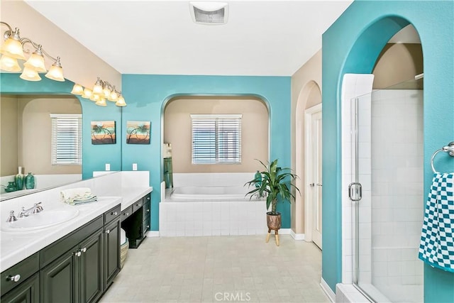 13744 Star Ruby Ave, Eastvale, CA 92880 - full bathroom with visible vents, a shower stall, a bath, and vanity