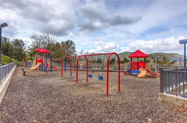 community playground featuring fence