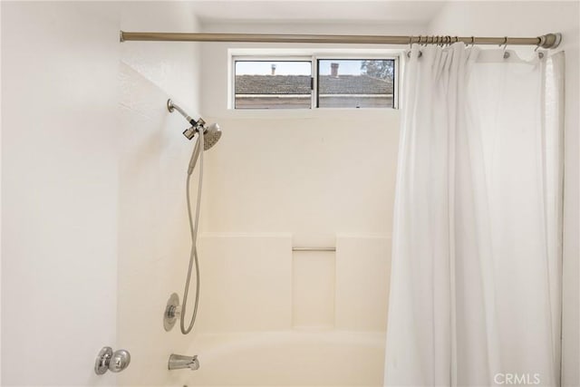 full bath featuring shower / bath combination with curtain